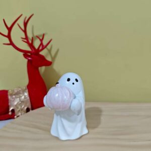 Ghost holding pumpkin