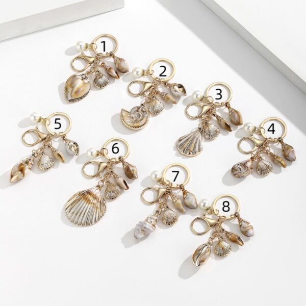 oly-185318fb32eeb4a9106e4bb95e18f410 Wholesale Resin Gold Plated Shell Keychain Pendant for Bag Car Decoration Boutique Resale