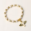 Wholesale Trendy Cross Bracelet Elastic Acrylic White Silver Beads Angel Design Fashion Accessory
