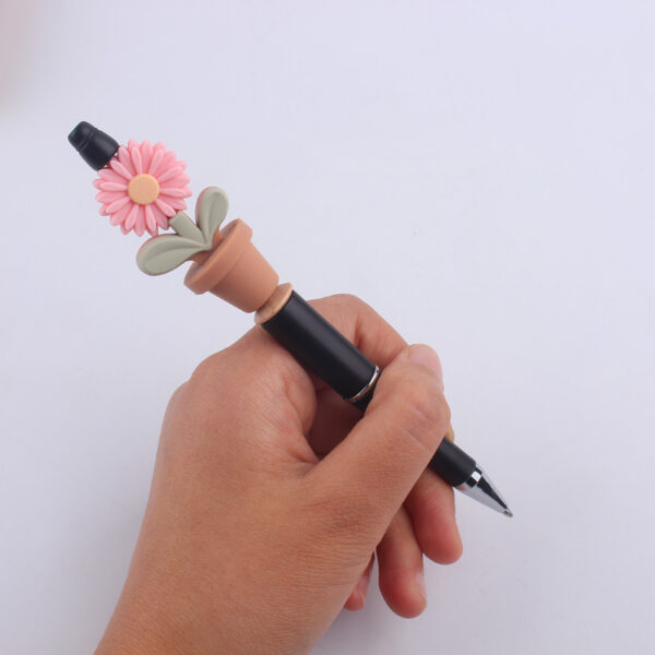 oly-1b64a5791c05fc42e15f01cf7d03d8d9 Wholesale Cartoon Sunflower DIY Beaded Pen Fashion Accessory Craft Supply