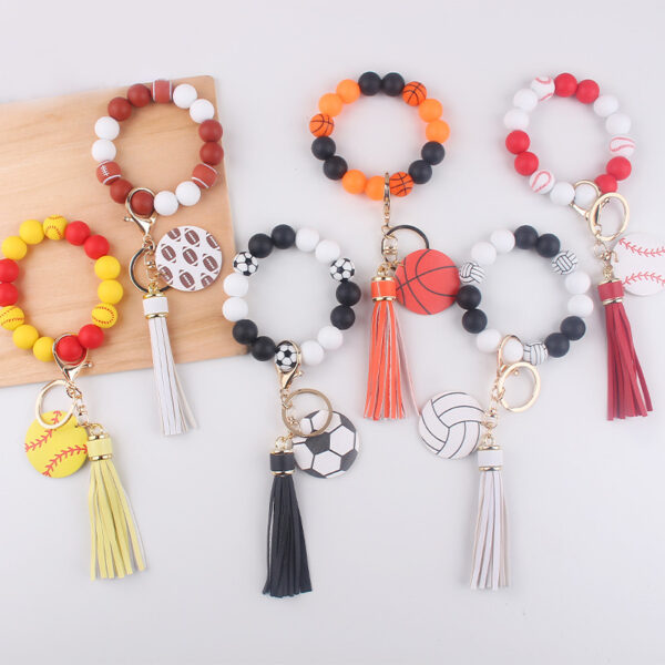 oly-1da06931ff42a7129231a2afa7eeaa85 Wholesale Silicone Football Wrist Keychain with DIY Beads Trendy Fashion Accessory for Gift or Everyday Use