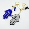 oly-206ec999c4ed322d67a992619e27c1b6 Wholesale Trendy Hamsa Hand Rhinestone Keychain Light Blue Flannel with Tassel Boutique Resale Gift