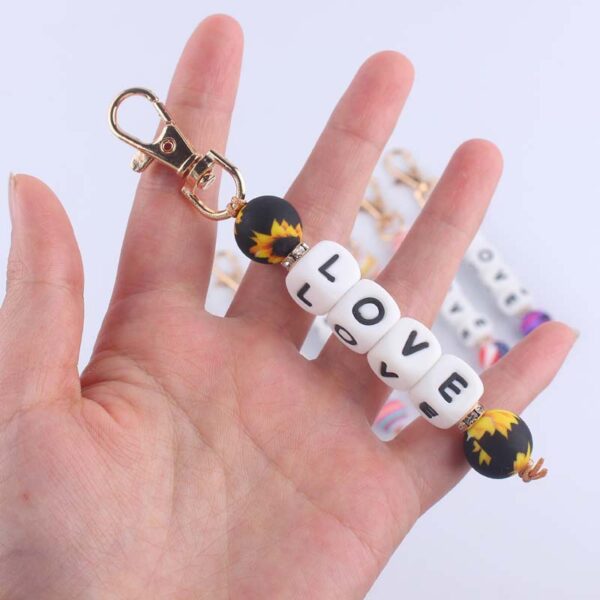 oly-209effb0c4726cee32e8627b580003f7 Wholesale Silicone Korean Style DIY Bead Bracelet Keychain Pink Fashion Accessory for Resale