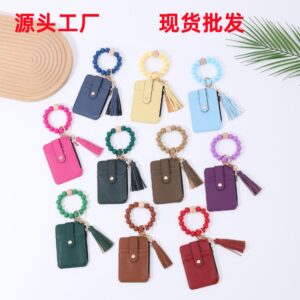 oly-20eee267ee6907dc3e37700933fe5012 Wholesale Tassel Yellow PU Card Case Keychain Wallet Trendy Decorative Accessory for Resale
