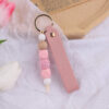 oly-21ec7305952c63249af958874c16d2d0 Wholesale Trendy Silicone Keychain Bag Charm Car Key Accessory DIY Pendant for Birthday Gift Resale