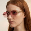 oly-22fc0fcec15a34544a92dad759536062 Wholesale Gold Rimless Y2K Sunglasses Retro Hip Hop Party Gift