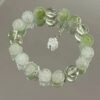 oly-234ce00bd1a5a38a0ee08463aa9e4b1b Wholesale Zinc Alloy Electroplated Green Floral Bracelet Fashion Accessory for Women