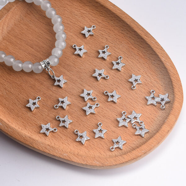 oly-2375c24fe57c559f1993631e2a559d6a Wholesale Stylish Five Point Star Hollow Pendant Zinc Alloy Electroplated DIY Jewelry Accessory