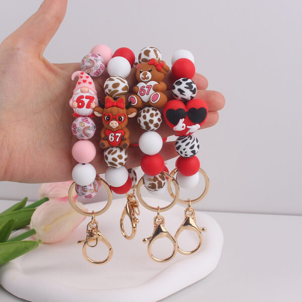 oly-23d7c049c84619c25c872e19914847e9 Wholesale Cow Print Silicone Bracelet Keychain Fashion Accessory Gift