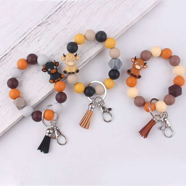 oly-24c0375166a28e7388c7b98cbc63e01d Wholesale Silicone Cartoon Cow 3D Keychain Khaki Festival Gift Fashion Accessory