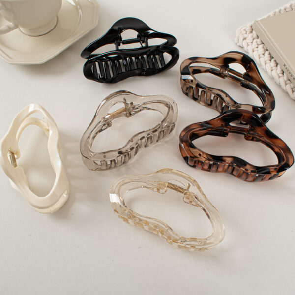 oly-2534802fe084b1e5ded6babdd4637521 Wholesale Plastic Hair Claw Clip Irregular Liquid Line Stylish Hair Accessory for Women