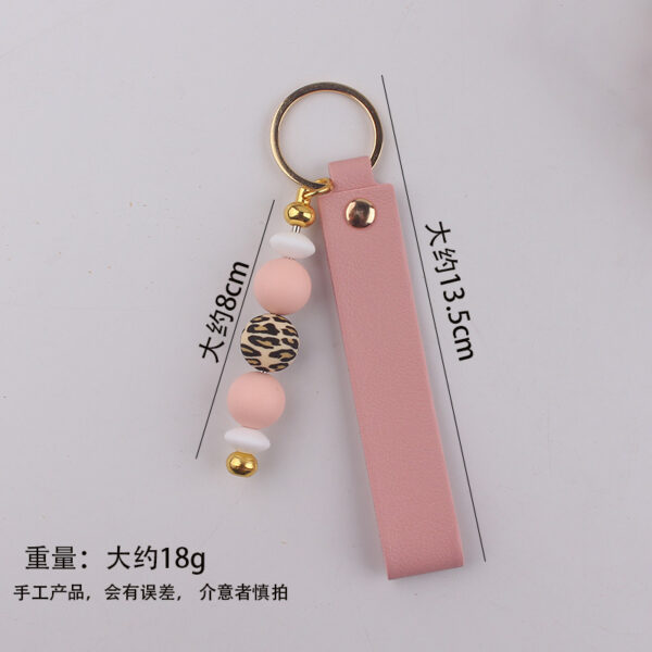 oly-253f3504c9b96e3a48c863fd3015ebfc Wholesale Stylish Silicone Khaki Keychain Pendant - Boutique Resale Bag Charm Gift
