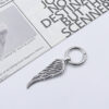 oly-25886496fd35004dd3abac8bebb8a4e4 Wholesale Angel Wings Alloy Keychain, Silver Fashion Accessory for Car Keys and Bags