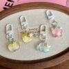 oly-25e3e72490cf0dd91a3a0ebebc7260ca Wholesale Resin Star Cloud Bag Charm Cute Keychain for Girls Trendy School Backpack Accessory