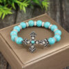 oly-29aa799c2534065e93ec640622e3d107 Wholesale Vintage Carved Cross Western Cowboy Blue Bead Bracelet Alloy Fashion Accessory