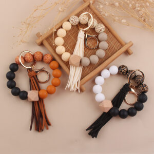 oly-29de11a391d89387c5d6a7fbbe16fcd6 Wholesale European Style Silicone Bead DIY Bracelet Keychain with Leather Tassel Fashion Jewelry Accessory Gift