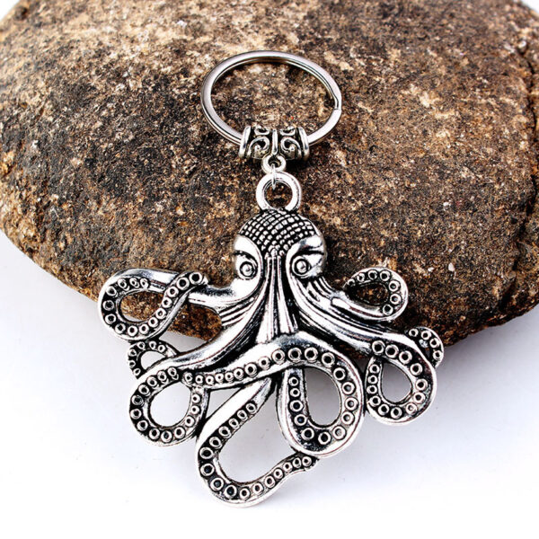 oly-2d1c25092ad9b060eaaf07ea415cf1b9 Wholesale Trendy Octopus Keychain Pendant Alloy Metal Fashion Accessory for Resale
