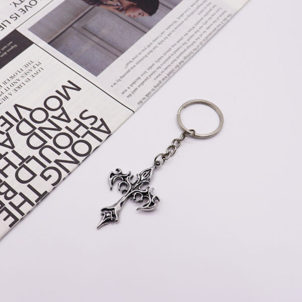 oly-2d26ce71be7e87f91ce632afd32c2957 Wholesale Silver Titanium Steel Flame Cross Keychain Trendy Car Key Accessory
