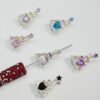 oly-2e02d6e6d8e45ca15db92709cd68ce19 Wholesale Eiffel Tower Double Sided Alloy Pendant Charm Purple DIY Phone Keychain Accessory