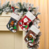 oly-2ef97277b9c325588166475e7bd547f5 Wholesale Polyester Plush Christmas Stocking Cartoon Santa Design Decorative Accessory for Holiday