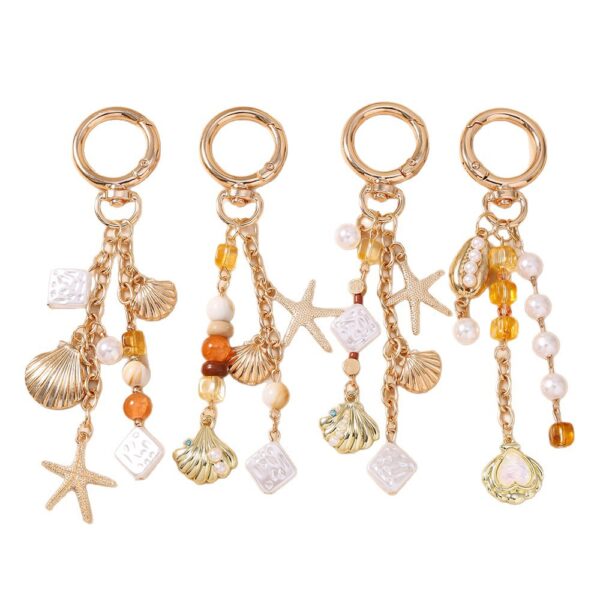 oly-30836ce327050981270030bd7fc642b6 Wholesale Sea Star Pearl Keychain Zinc Alloy Bag Charm Decorative Car Key Accessory