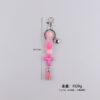 oly-30bfb854c84b591125661c0074546e4d Wholesale Silicone Cross Tassel Beaded Keychain Black White Car Key Accessory Boutique Resale