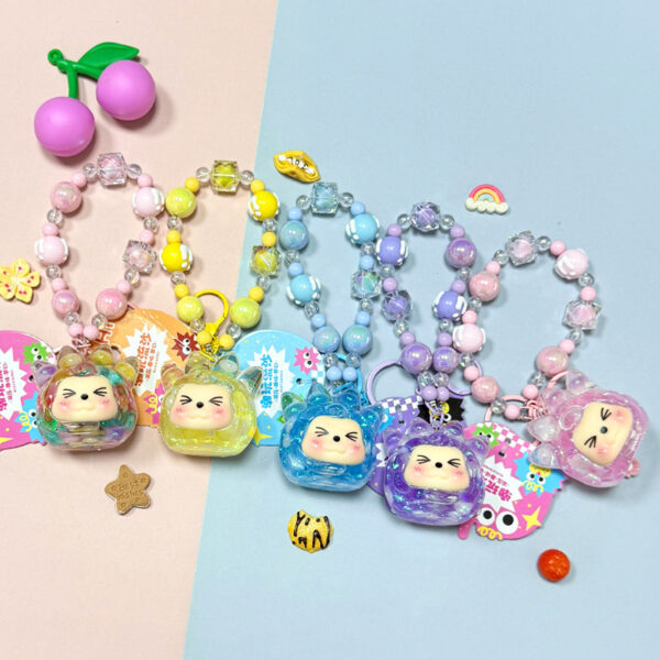 Wholesale Boutique Acrylic Luminous Sand Bottle Keychain Trendy Bag Charm for Women Birthday Gift