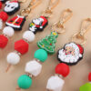 oly-320d482a84930c778cf602b345f0ce17 Wholesale Silicone Santa Claus Keychain Chic Holiday Gift Bag Charm Car Accessory
