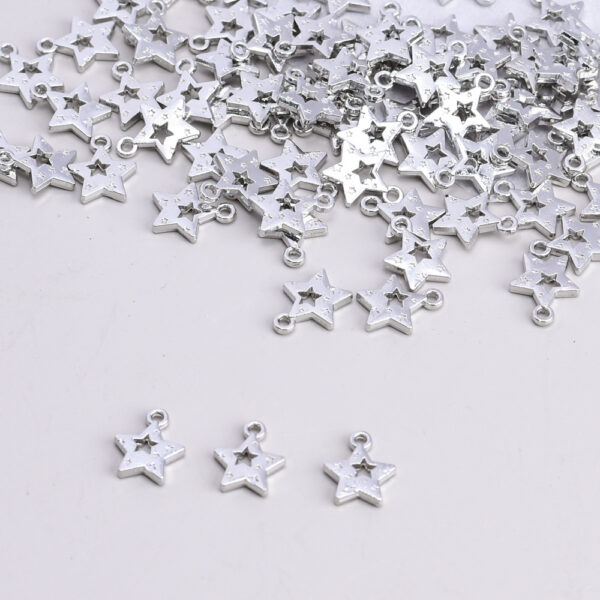 oly-324f94bf5bf411e3d92f0039f90f0405 Wholesale Hollow Five Pointed Star White Tone Alloy Charm DIY Jewelry Bag Charm Fashion Accessory