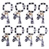 oly-326e34ed4500553bfe0d133c1d03c7e7 Wholesale Silicone Cartoon Cow Head Keychain with Bead Bracelet and Tassel Korean Style Decorative Accessory