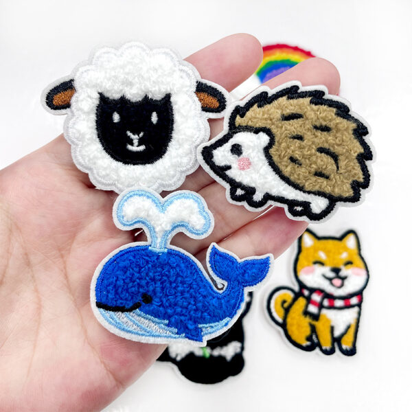 oly-328d349791ecdd7f5b64af684da6bff9 Wholesale Cartoon Animal Rainbow Sun Whale Towel Embroidery Patches, Chic Fashion Accessory for Shoes and Bags