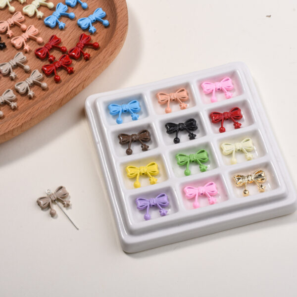oly-32b5f94095ee64550eb1192c200a7f7e Wholesale Scattered Mixed Color Alloy Beads with Hemp Rope Bow and Star Pattern DIY Craft Supply