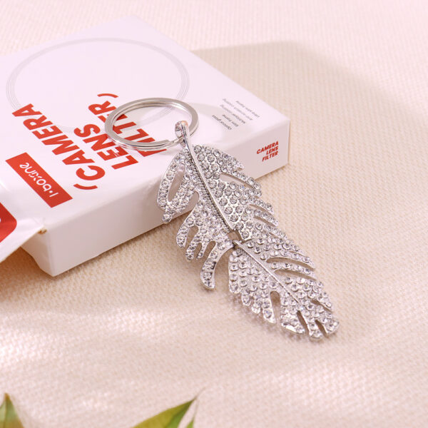 oly-33e4d85861e1c4f098cf831c16c1a277 Wholesale Light Luxury Feather Rhinestone Long Pendant Keychain Metal Car Key Accessory