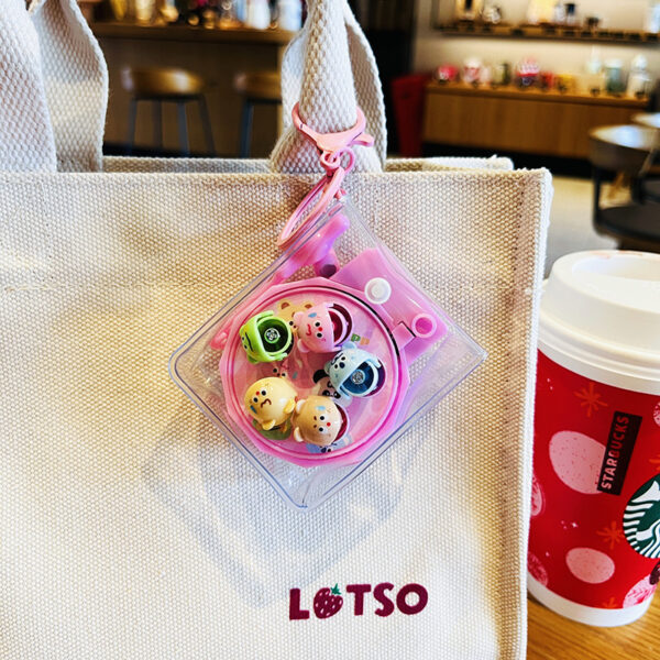 oly-345580ce61e8137a4896cac4530d44a6 Wholesale Cartoon Rotating Fishing Plate Keychain for Schoolbag Fun Gift Boutique Resale