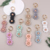 oly-34b5d74fc08554770723a1215b47bdea Wholesale Silicone DIY Beaded Bracelet Keychain Cartoon Flower Decorative Accessory Party Gift