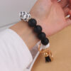 oly-35317a0f9039fe0472f5c337abab697b Wholesale Silicone Cross Print Bead Bracelet Keychain with PU Tassel Fashion Accessory for Resale