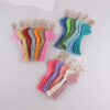 oly-39bb13911206fab9ca41bd958da1f030 Wholesale Bohemian Heart Tassel Silicone Bag Charm Trendy Keychain for Party Gifts