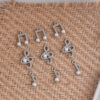 oly-3ab0b26ac7c799792027b2abb762d915 Wholesale Zinc Alloy Electroplated White Music Note Pendant DIY Keychain Accessory Fashion Craft Supply