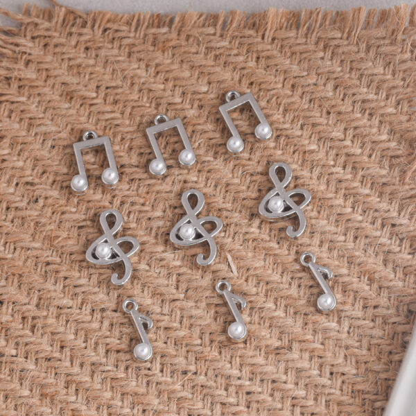 oly-3ab0b26ac7c799792027b2abb762d915 Wholesale Zinc Alloy Electroplated White Music Note Pendant DIY Keychain Accessory Fashion Craft Supply
