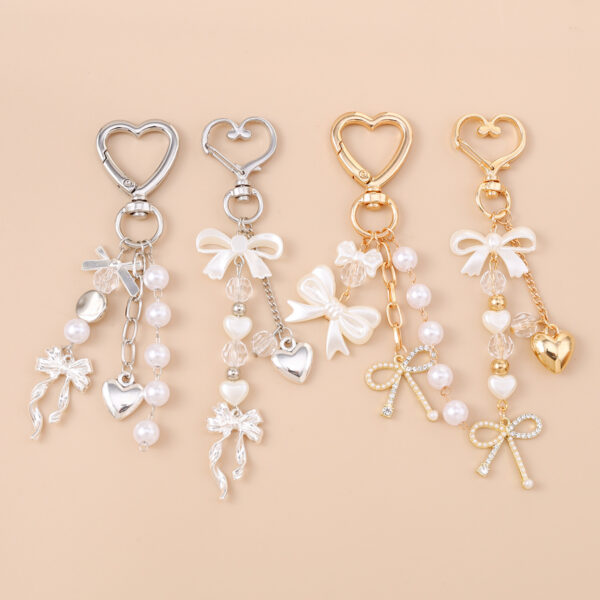 Wholesale Resin Golden Love Bow Heart Key Chain, Pearl Bow Keyring Trendy Boutique Resale Key Accessory