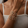 oly-3baf1c3c8cd707001d725d2f03d5e952 Wholesale Cross Pearl Hollow Design Bracelet Fashion Jewelry Accessory Gift