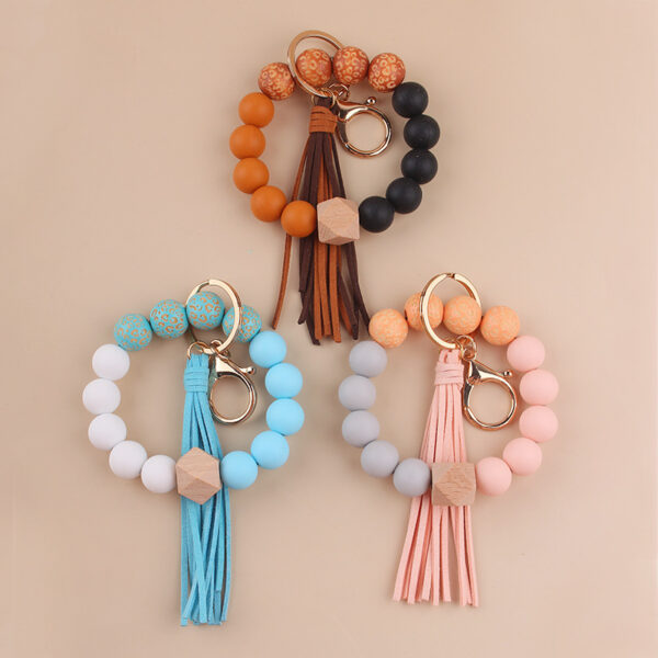 oly-3bd50998cf9736c60c1579354d9d483d Wholesale European Style Silicone Bead DIY Bracelet Keychain with Leather Tassel Fashion Jewelry Accessory Gift