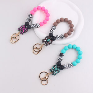 oly-3c15b89fa8a4ea426caddf77ddf6a55d Wholesale Korean Style Silicone Cow Bow Keychain Charm Trendy Bag Car Key Accessory Gift