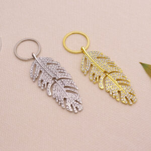 oly-3d5aae6471172c569439a5957d01d23a Wholesale Light Luxury Feather Rhinestone Long Pendant Keychain Metal Car Key Accessory