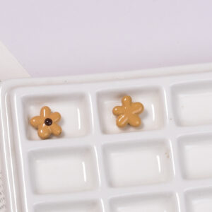 Brown dotted oil flowers