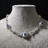 oly-3dba9d65e7d8a600e04c1fd2e86eddd9 Wholesale Zinc Alloy Snake Bone Chain Necklace with Blue Eye Pendant Halloween Punk Style Jewelry Accessory for Everyday Wear
