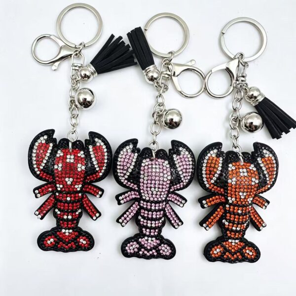 oly-40843537723dd7026112e7b66fb4dddb Wholesale Fashion Rhinestone Lobster Keychain Leather Tassel Bag Charm for Boutique Resale