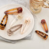 oly-409bda0386444293bcf0fc867e7504cb Wholesale Korean Style Transparent Champagne Hair Clips for Women Plastic/Resin Side Clip Hair Accessory