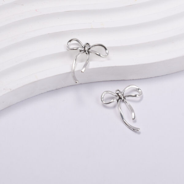 Wholesale Chic Bow Pendant Alloy Baking Paint DIY Jewelry Accessory for Necklace Keychain Craft
