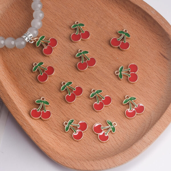 oly-437d61adf499eae3efc029dad90908cd Wholesale Alloy Baked Red Cherry Pendant Trendy Jewelry Accessory for DIY Bag Charm Keychain